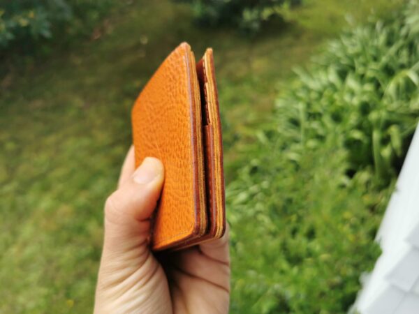 Brown bifold wallet with burnished edeges