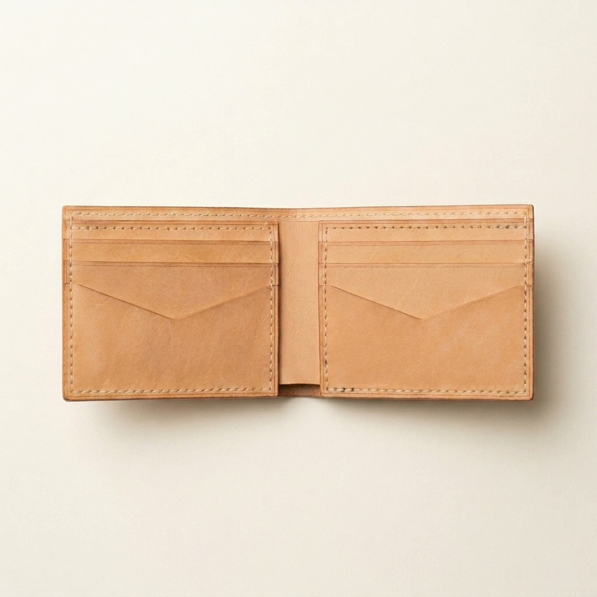 The Aba wallet in Natural colour and open to show pockets